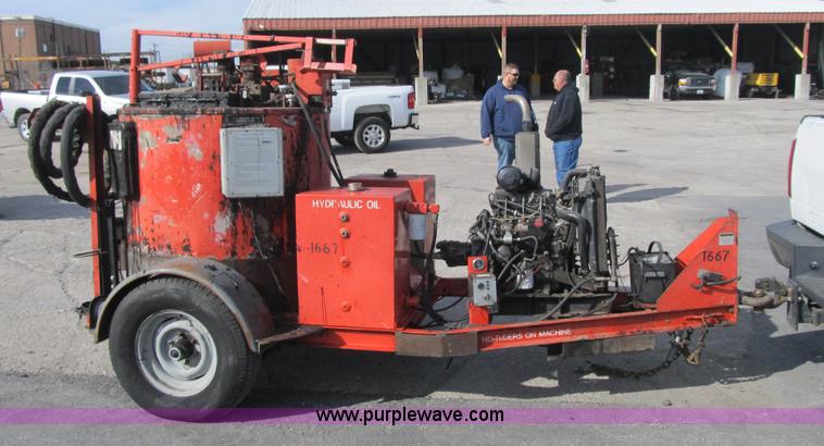 image for item F8964 1999 Crafco Super Shot SS125 melter applicator