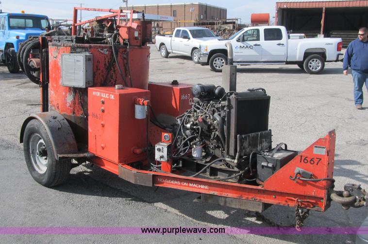 image for item F8964 1999 Crafco Super Shot SS125 melter applicator