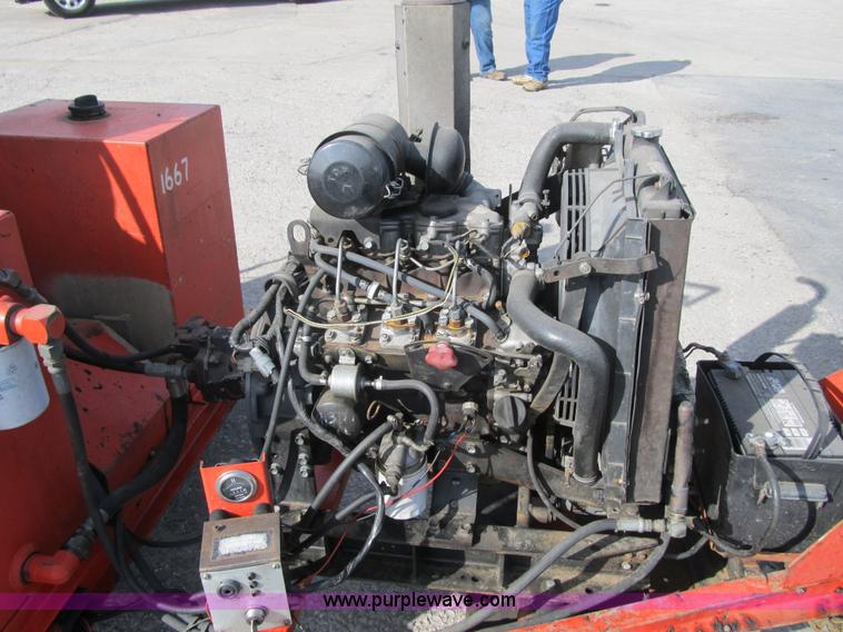 image for item F8964 1999 Crafco Super Shot SS125 melter applicator