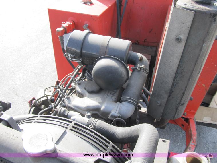 image for item F8964 1999 Crafco Super Shot SS125 melter applicator