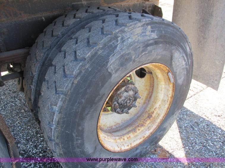 image for item I8774 2001 Freightliner FL70 dump truck