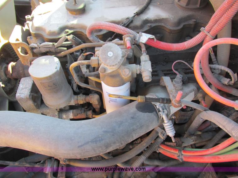 image for item I8774 2001 Freightliner FL70 dump truck