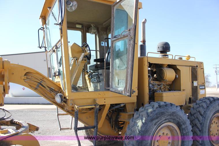 image for item J2305 1988 Caterpillar 140G articulated motor grader