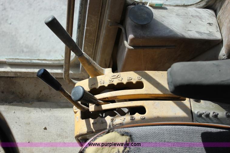 image for item J2305 1988 Caterpillar 140G articulated motor grader