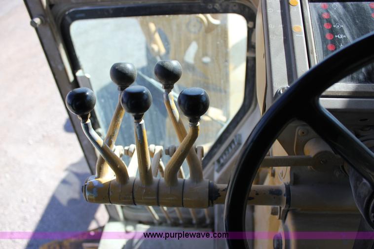 image for item J2305 1988 Caterpillar 140G articulated motor grader