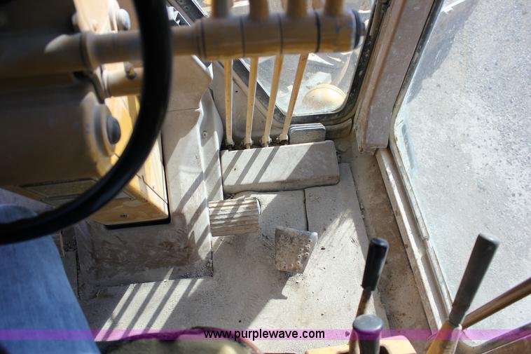 image for item J2305 1988 Caterpillar 140G articulated motor grader