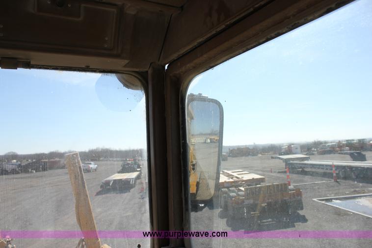 image for item J2305 1988 Caterpillar 140G articulated motor grader