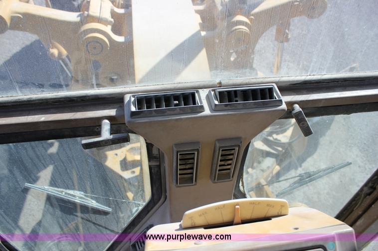 image for item J2305 1988 Caterpillar 140G articulated motor grader