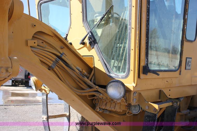 image for item J2305 1988 Caterpillar 140G articulated motor grader