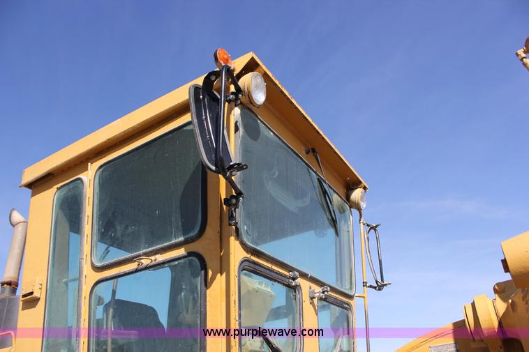 image for item J2305 1988 Caterpillar 140G articulated motor grader