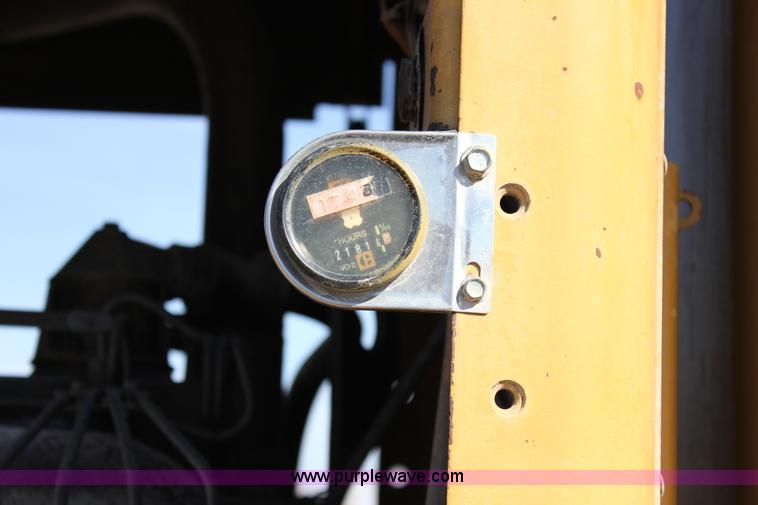 image for item J2305 1988 Caterpillar 140G articulated motor grader