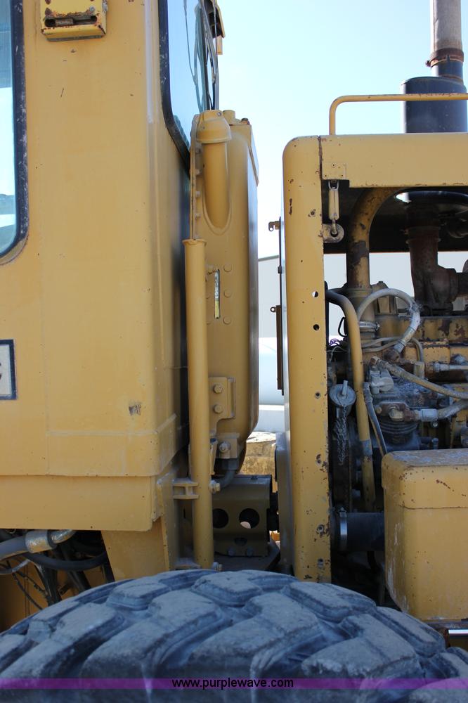 image for item J2305 1988 Caterpillar 140G articulated motor grader