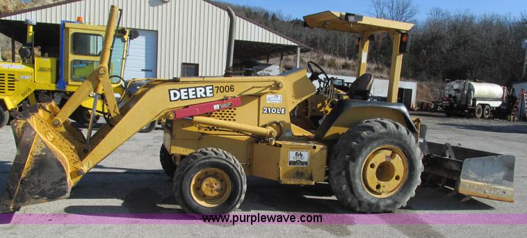 image for item K2003 1999 John Deere 210LE landscape tractor