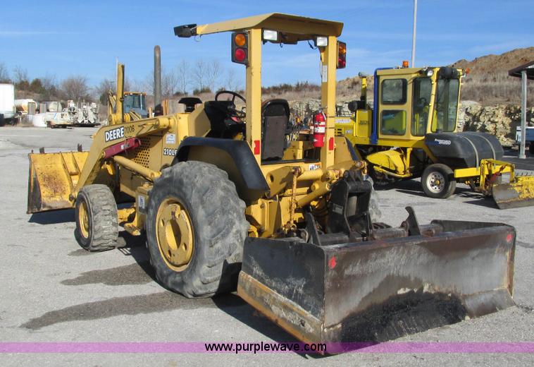 image for item K2003 1999 John Deere 210LE landscape tractor