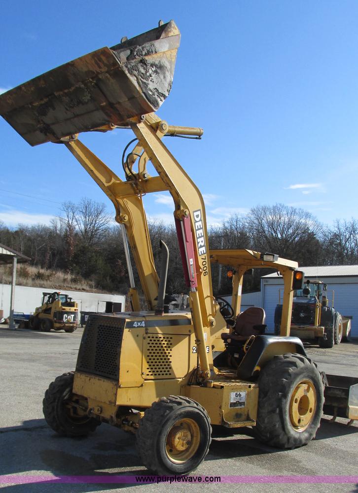 image for item K2003 1999 John Deere 210LE landscape tractor