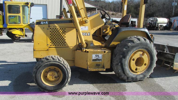 image for item K2003 1999 John Deere 210LE landscape tractor