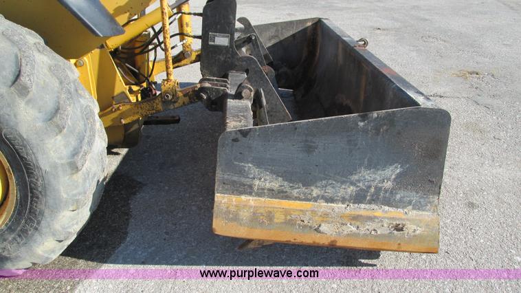 image for item K2003 1999 John Deere 210LE landscape tractor