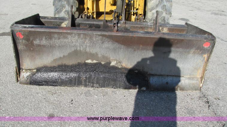 image for item K2003 1999 John Deere 210LE landscape tractor