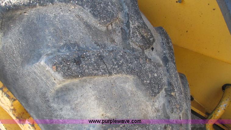 image for item K2003 1999 John Deere 210LE landscape tractor