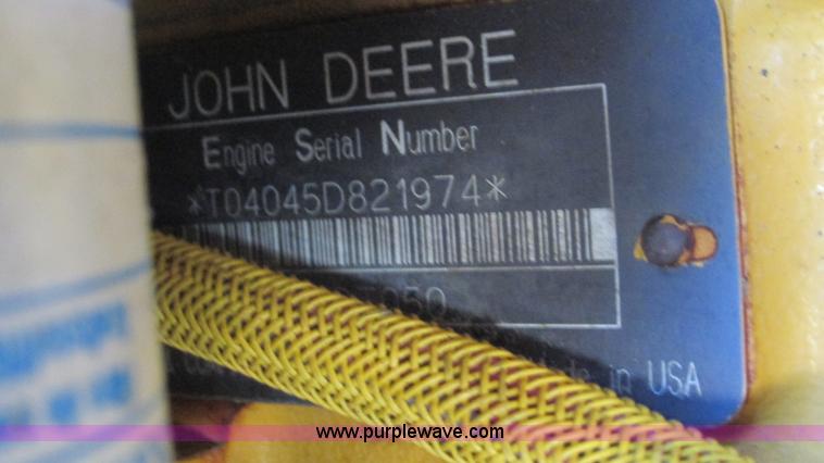 image for item K2003 1999 John Deere 210LE landscape tractor