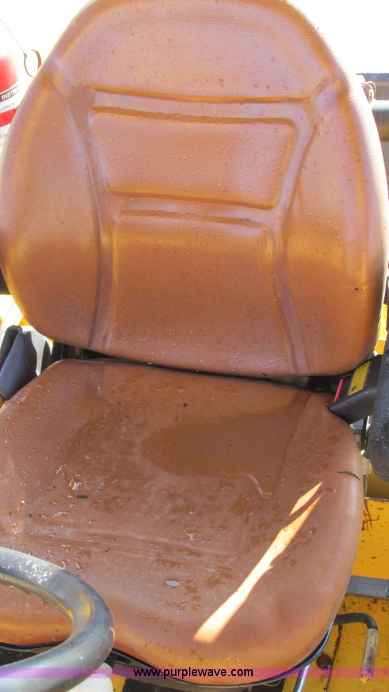 image for item K2003 1999 John Deere 210LE landscape tractor