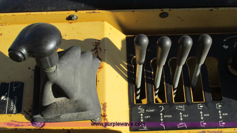 image for item K2003 1999 John Deere 210LE landscape tractor