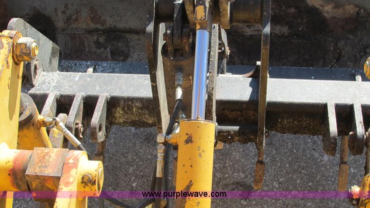 image for item K2003 1999 John Deere 210LE landscape tractor