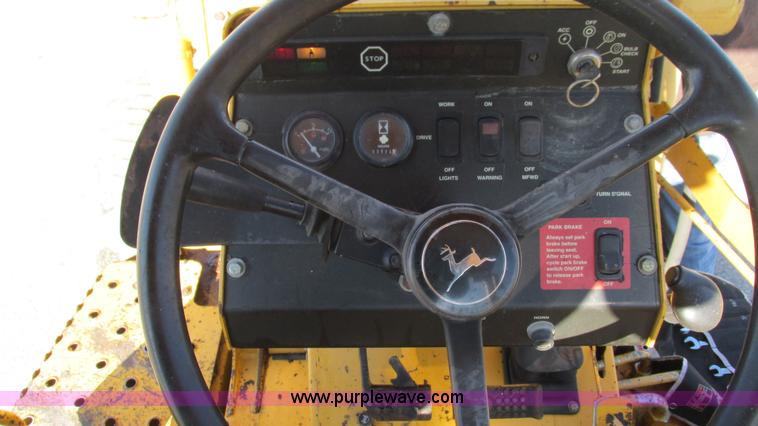 image for item K2003 1999 John Deere 210LE landscape tractor