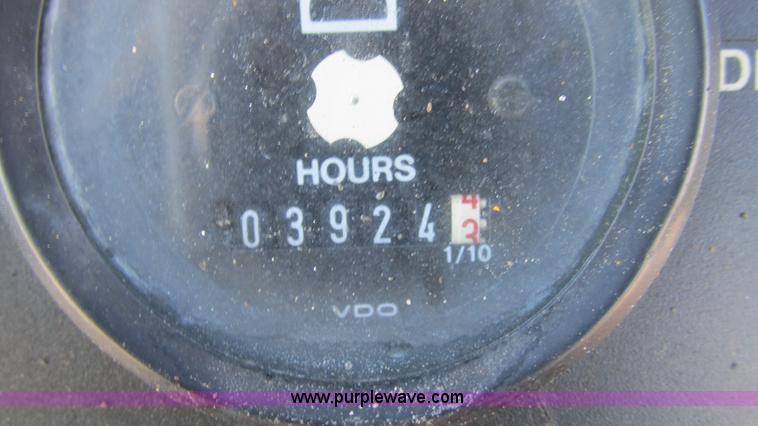 image for item K2003 1999 John Deere 210LE landscape tractor