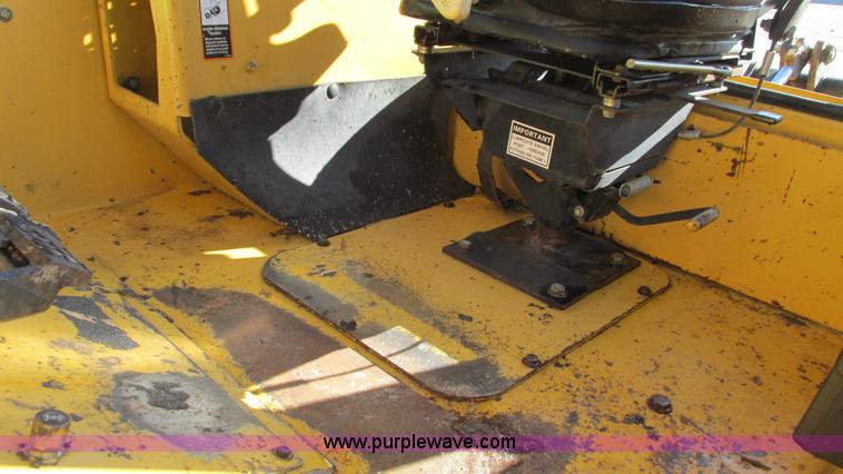 image for item K2003 1999 John Deere 210LE landscape tractor