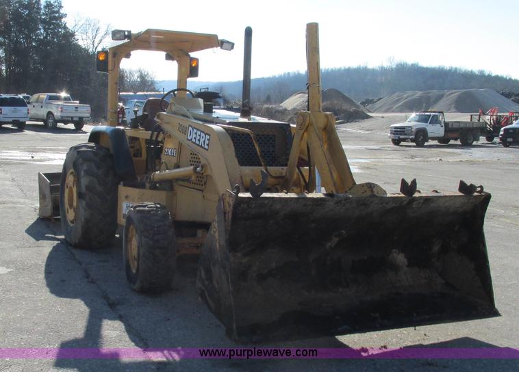 image for item K2003 1999 John Deere 210LE landscape tractor