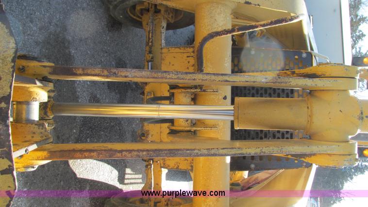 image for item K2003 1999 John Deere 210LE landscape tractor