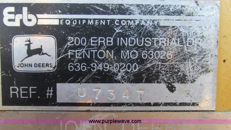 image for item K2003 1999 John Deere 210LE landscape tractor