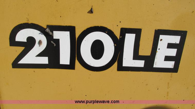 image for item K2003 1999 John Deere 210LE landscape tractor