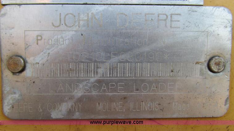 image for item K2003 1999 John Deere 210LE landscape tractor