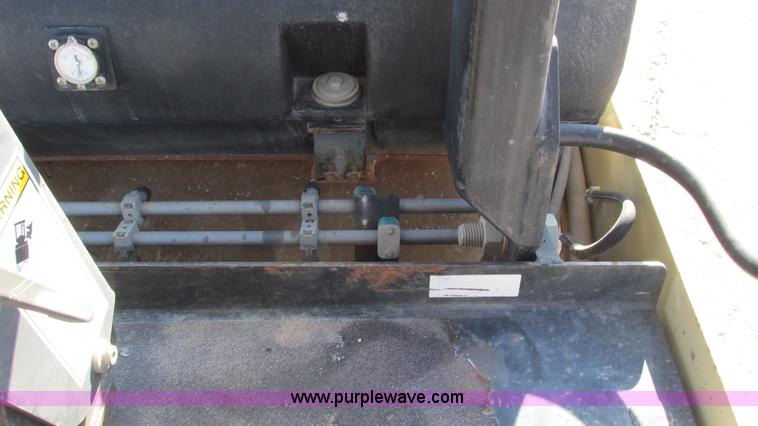 image for item K2004 2005 Ingersoll Rand DD70 vibratory smooth double drum roller