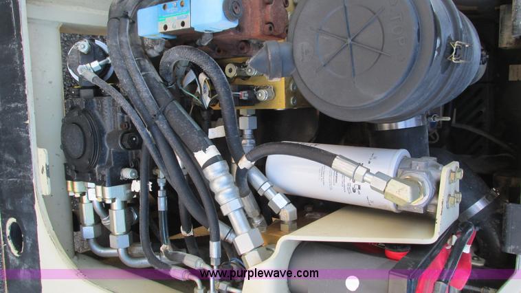 image for item K2004 2005 Ingersoll Rand DD70 vibratory smooth double drum roller