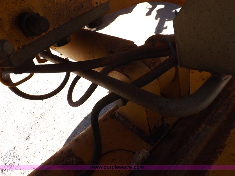 image for item K3197 2003 John Deere 770CH articulated motor grader