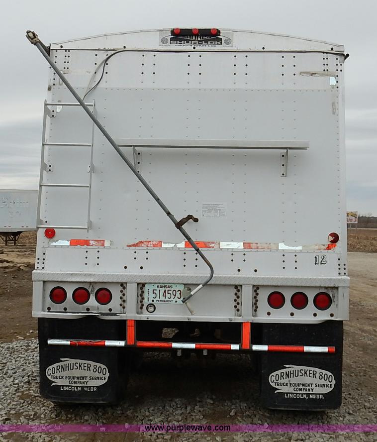 image for item I5063 2000 Corn Husker double hopper grain trailer