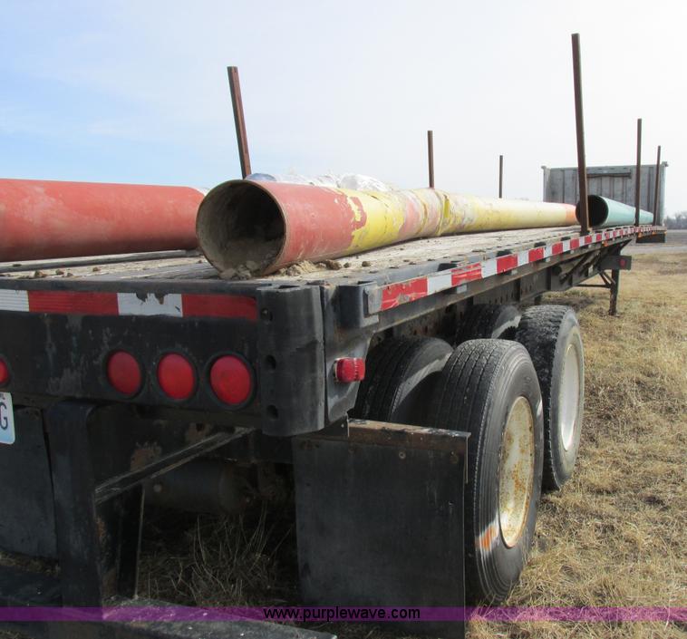 image for item K2019 1996 Transcraft TL2000 Super Beam flatbed trailer