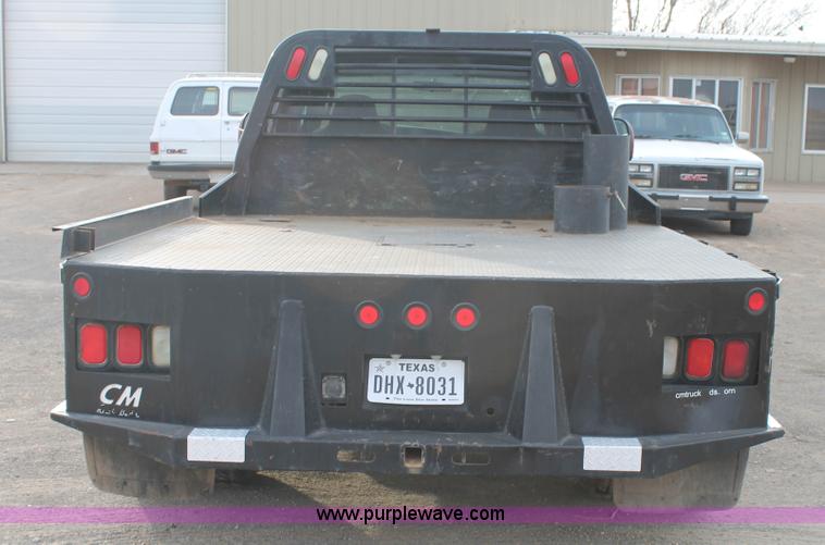 image for item AW9470 2006 Ford F350 Super Duty Crew Cab flatbed truck