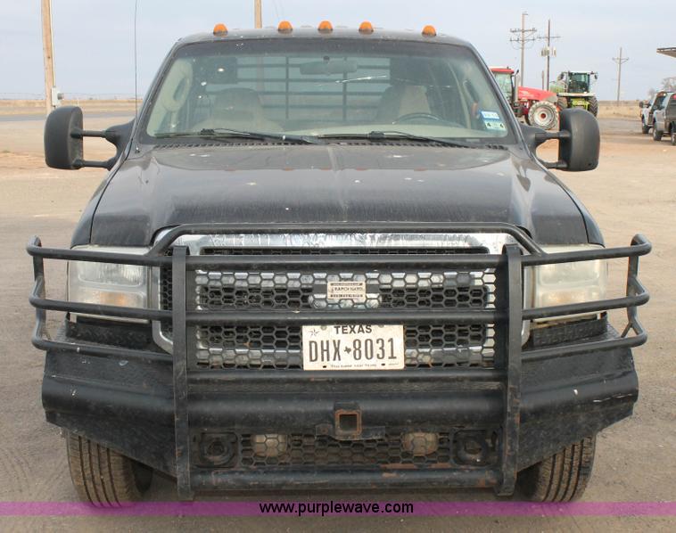 image for item AW9470 2006 Ford F350 Super Duty Crew Cab flatbed truck