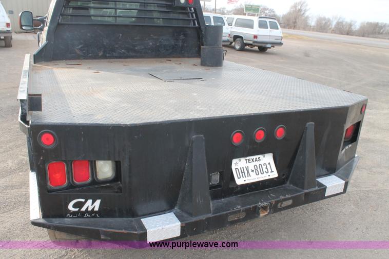 image for item AW9470 2006 Ford F350 Super Duty Crew Cab flatbed truck