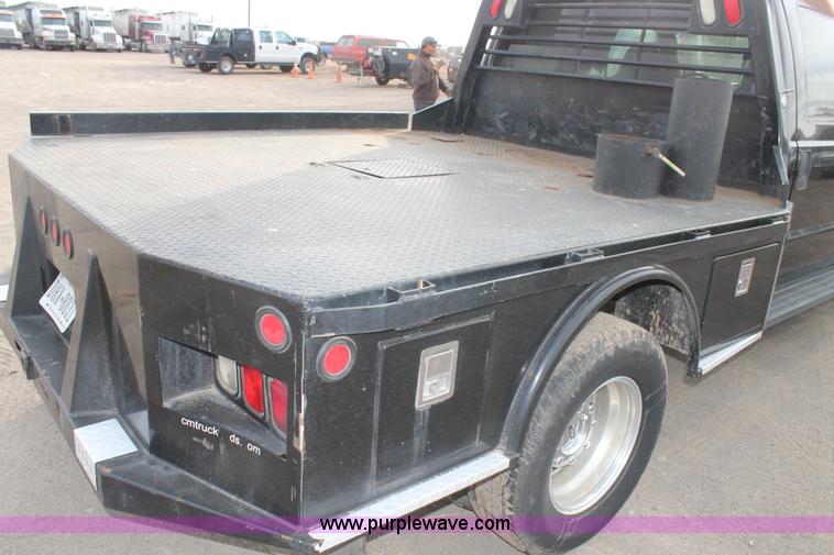 image for item AW9470 2006 Ford F350 Super Duty Crew Cab flatbed truck