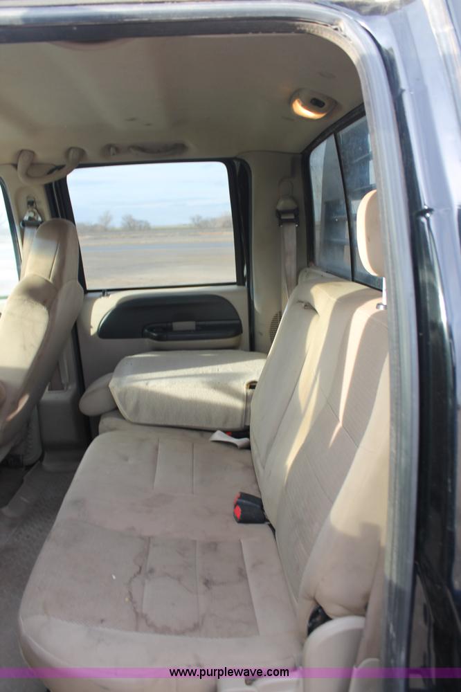 image for item AW9470 2006 Ford F350 Super Duty Crew Cab flatbed truck