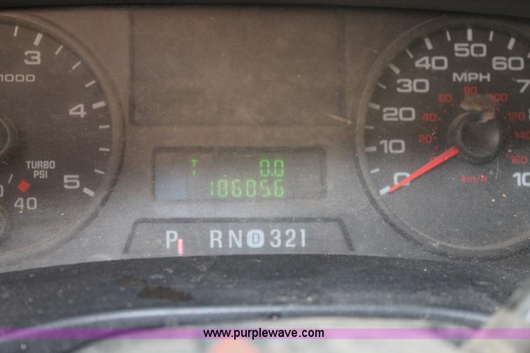 image for item AW9470 2006 Ford F350 Super Duty Crew Cab flatbed truck