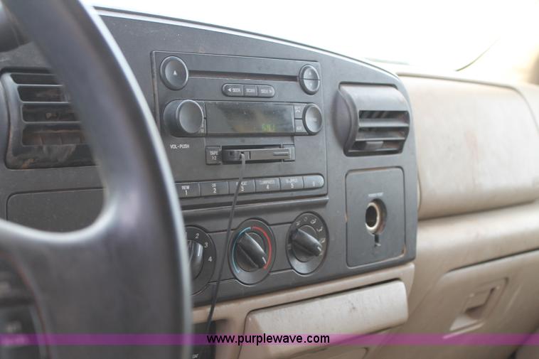 image for item AW9470 2006 Ford F350 Super Duty Crew Cab flatbed truck