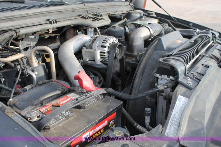 image for item AW9470 2006 Ford F350 Super Duty Crew Cab flatbed truck