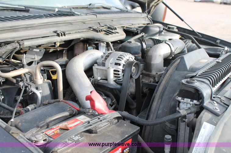 image for item AW9470 2006 Ford F350 Super Duty Crew Cab flatbed truck