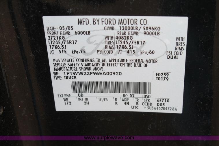 image for item AW9470 2006 Ford F350 Super Duty Crew Cab flatbed truck